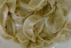 家常猪肉大葱蒸饺